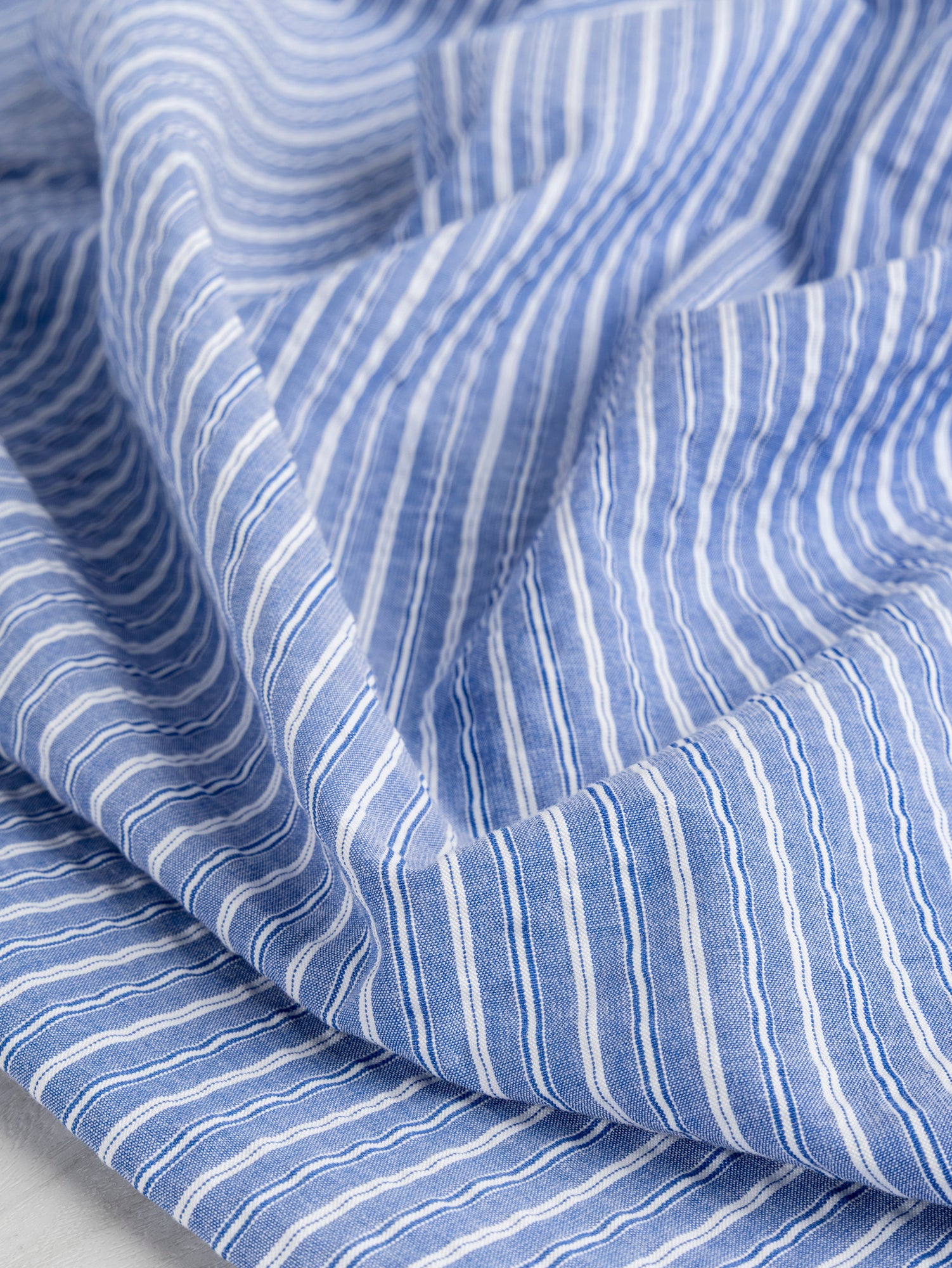 F-COT368-001-Textured-Stripe-Japanese-Cotton-Shirting-Indigo-and-White-Core-Fabrics-scrunched.JPG