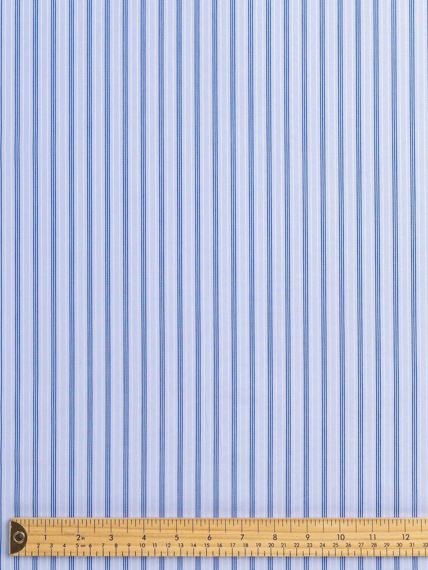 F-COT456-002-Textured-Stripe-Organic-Cotton-Shirting-Sky-Ocean-and-White-Core-Fabrics-ruler.webp