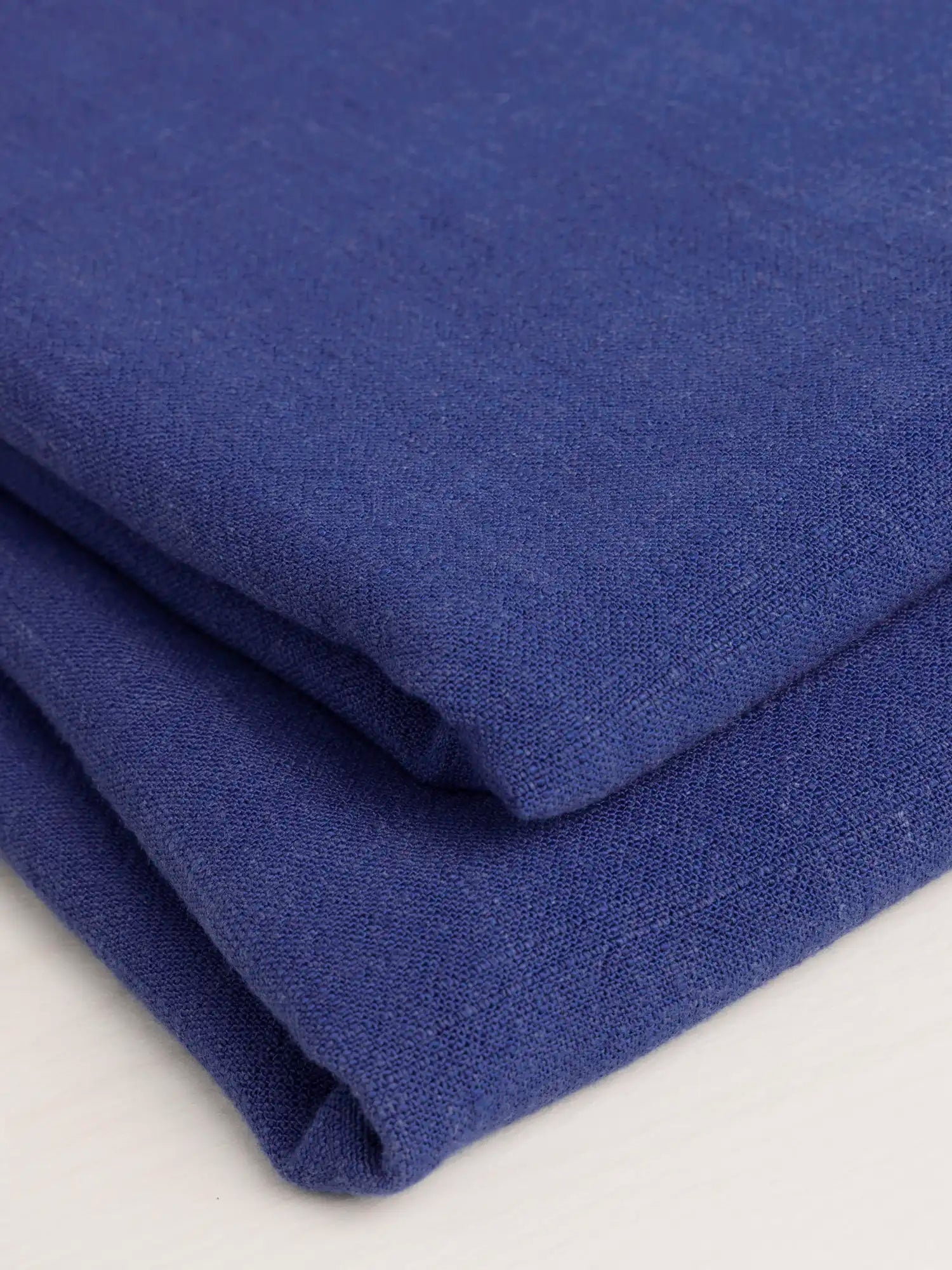F-VIS066-037-Textured-Viscose-Linen-Blue-Iris-Core-Fabrics-fold.webp