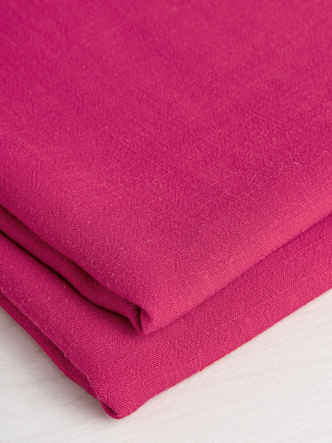 F-VIS066-034-Textured-Viscose-Linen-Fuchsia-Core-Fabrics-fold