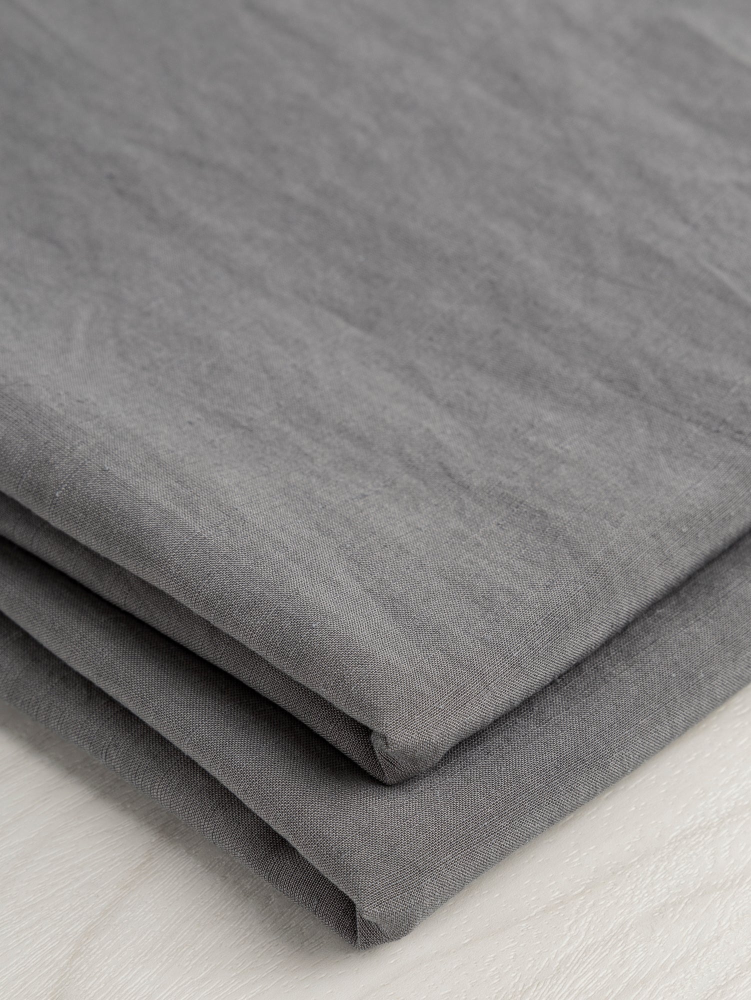 F-DEA054-001-Textured-Viscose-Linen-Deadstock-Silver-Sage-Core-Fabrics-fold.JPG