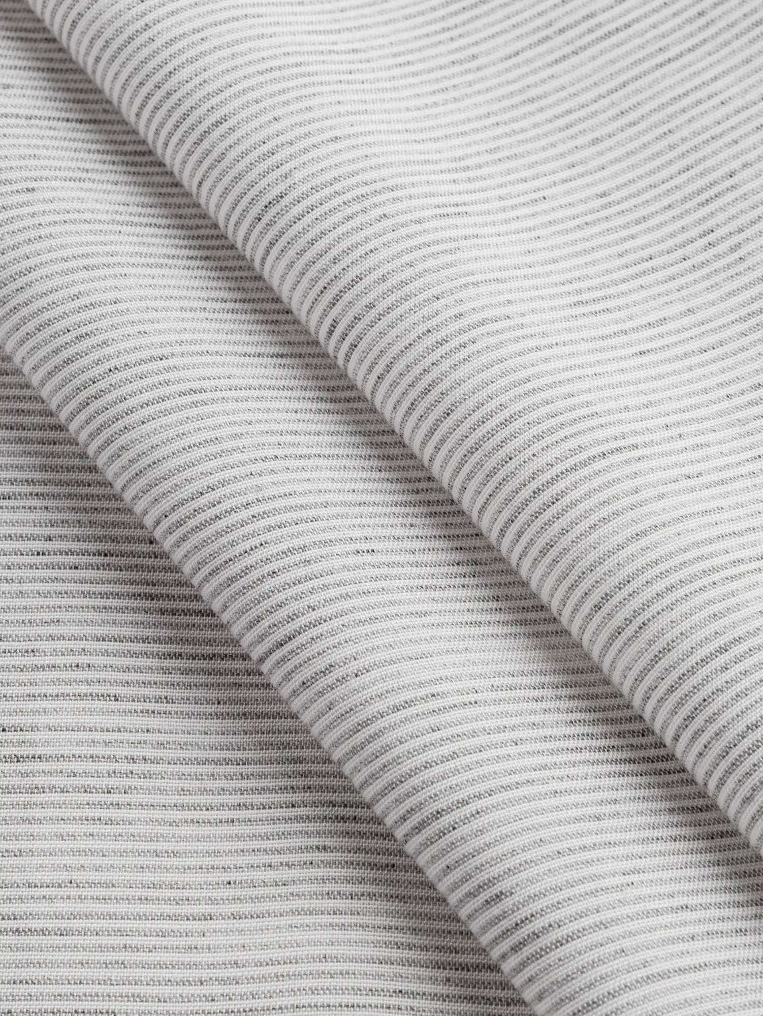 F-DEA215-ThinStripe-Cotton-Voile-Deadstock-White-and-Cloud-Core-Fabrics-fold.webp
