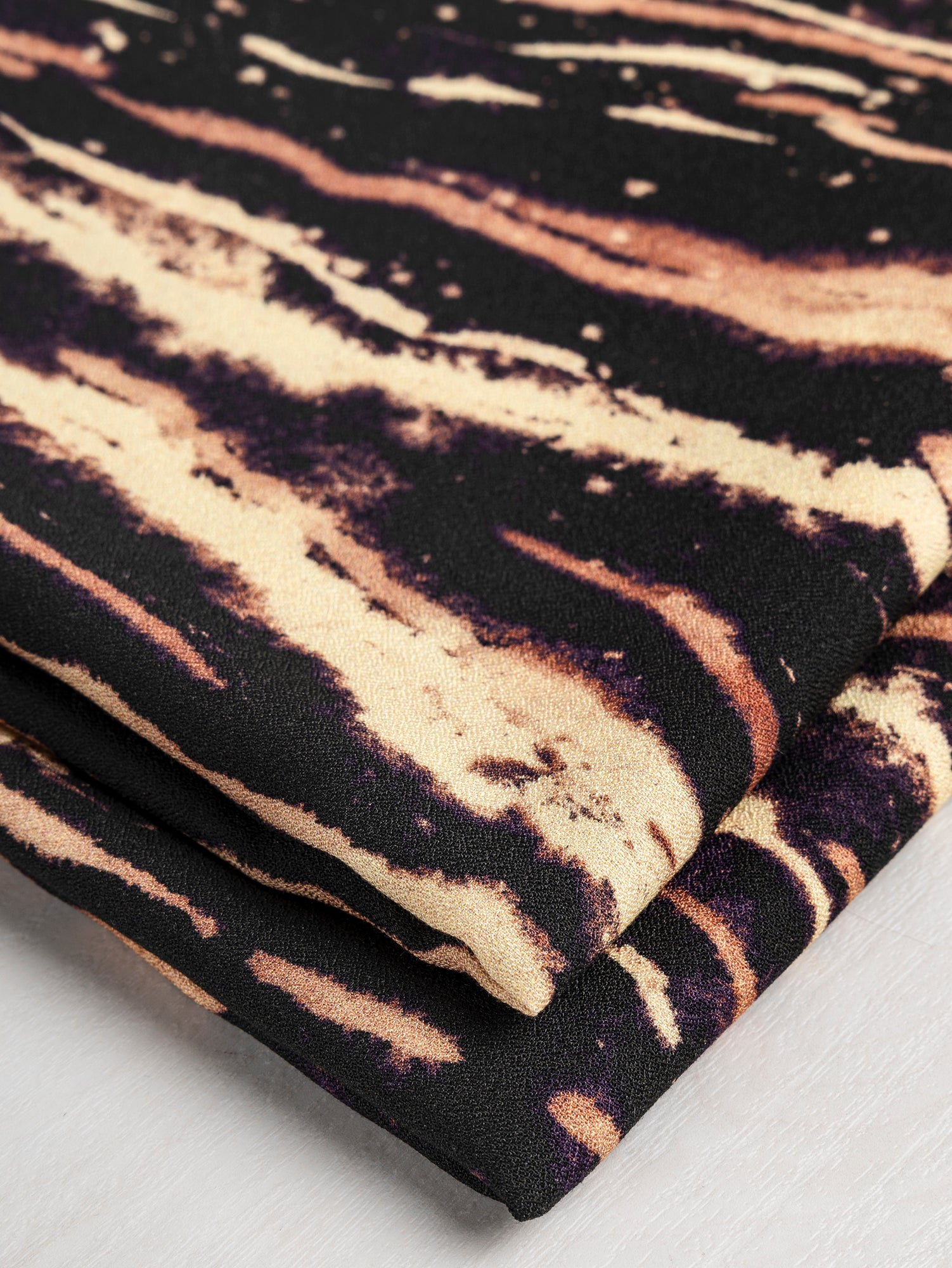 F-VIS236-Tiger-Print-Ecovero-Viscose-Crepe-Black-Brown-Core-Fabrics-fold