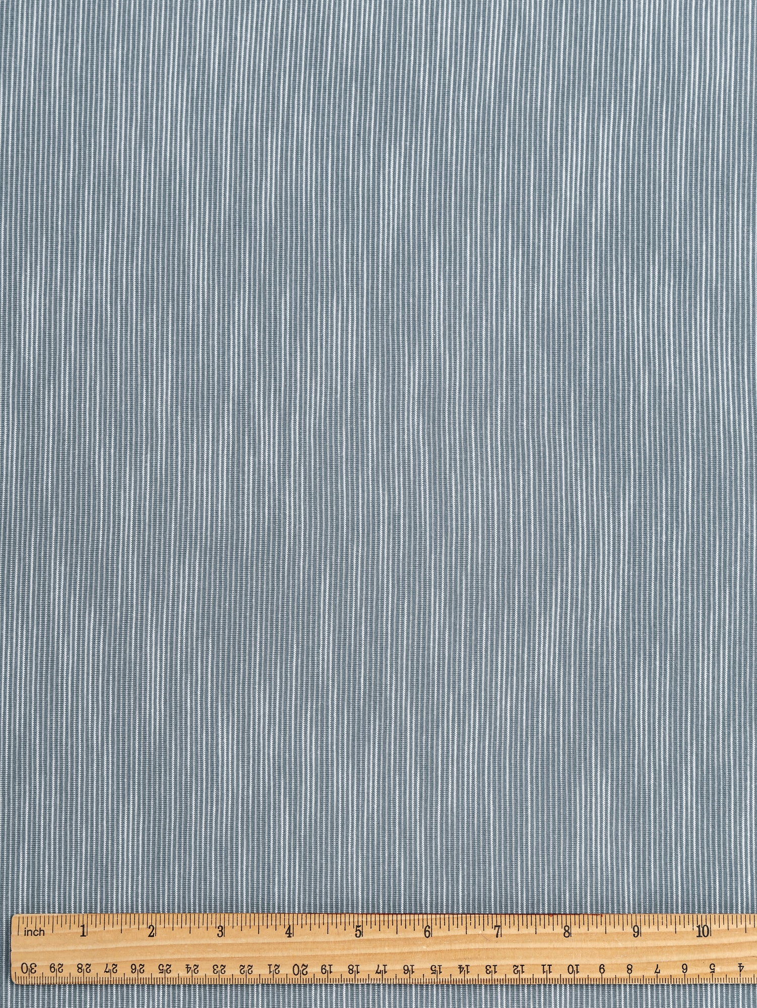 F-DEA020-Tiny-Stripe-Cotton-Spandex-Jersey-Knit-Deadstock-Blue-and-White-Core-Fabrics-ruler.JPG