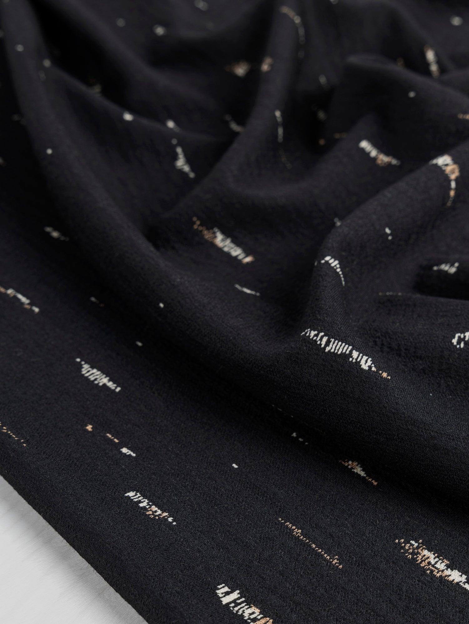 F-DEA007-003-Tree-Bark-Jacquard-Knit-Deadstock-Black-Core-Fabrics-scrunched