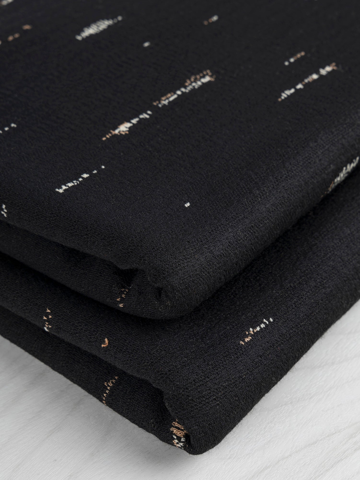 F-DEA007-003-Tree-Bark-Jacquard-Knit-Deadstock-Black-Core-Fabrics-fold