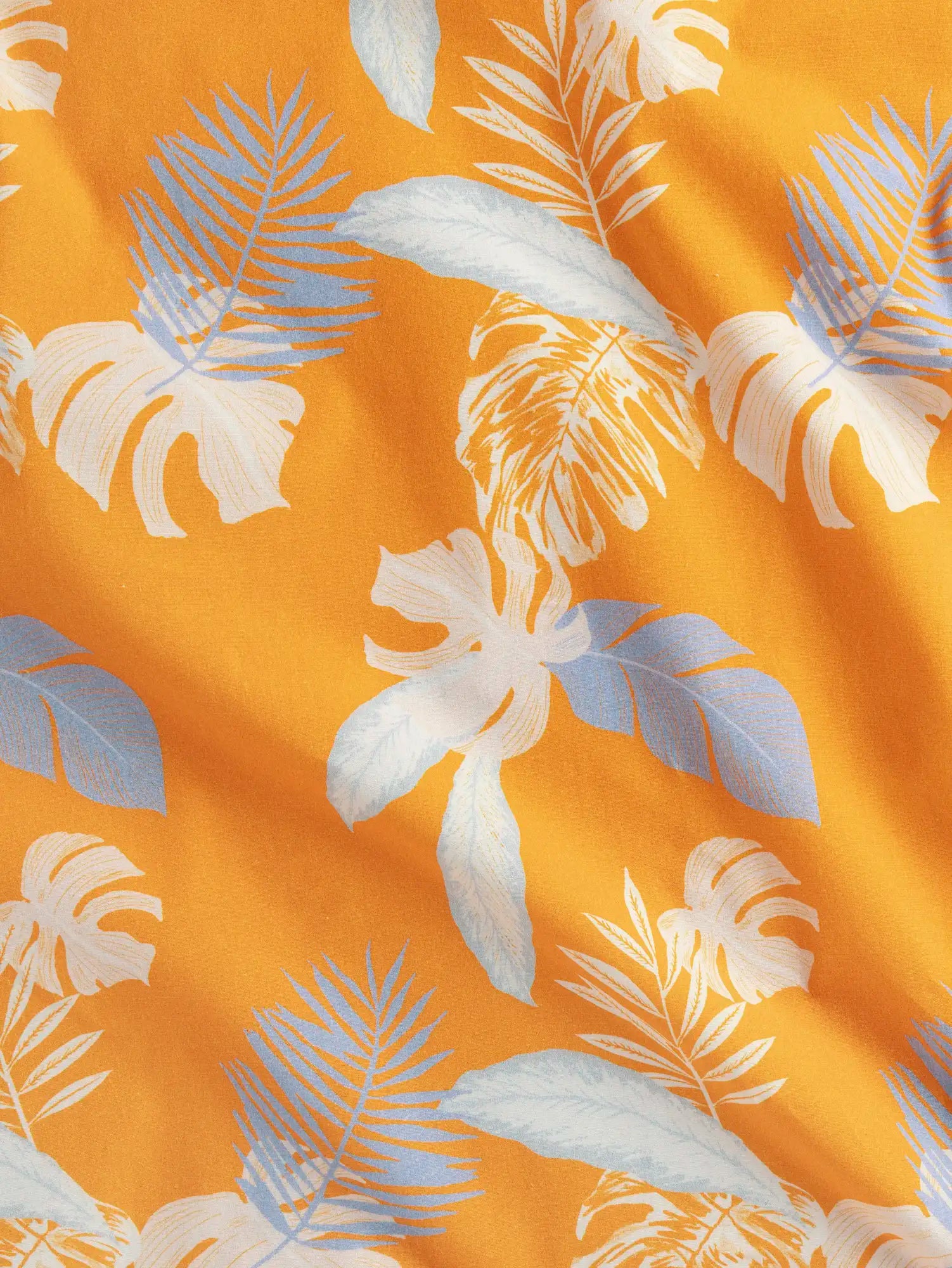 F-DEA242-Tropical-Print-Stretch-Cotton-Woven-Deadstock-Orange-Lavender-and-Mist-Core-Fabrics-scrunched.webp