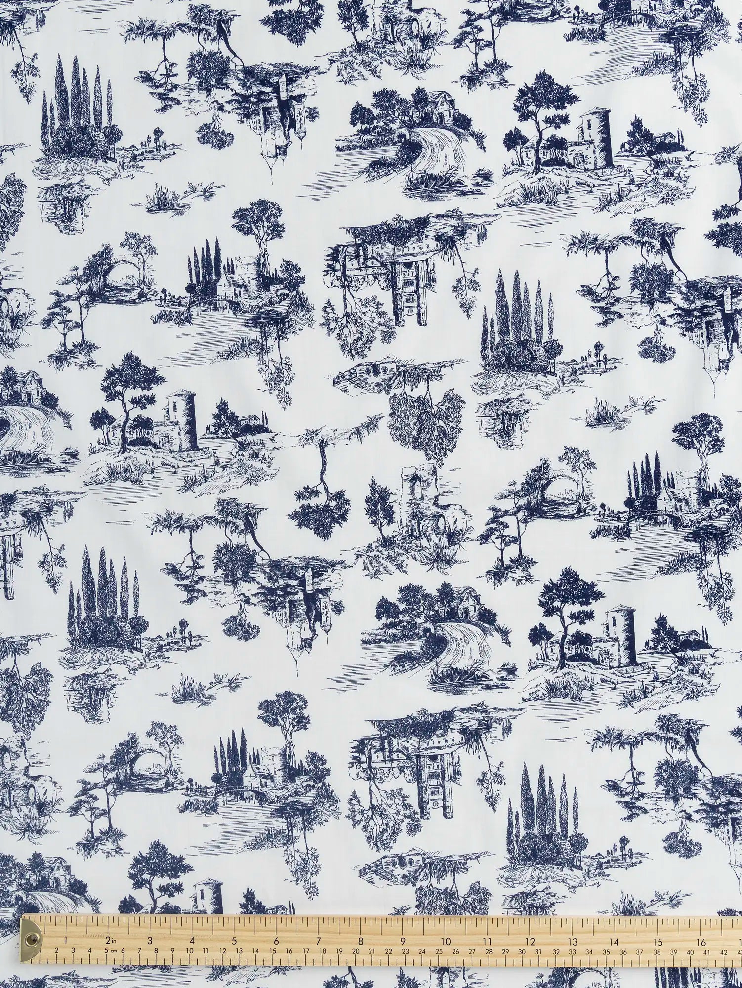 F-COT406-Tuscany-Toile-Print-Japanese-Cotton-Lawn-White-and-Indigo-Core-Fabrics-ruler.webp