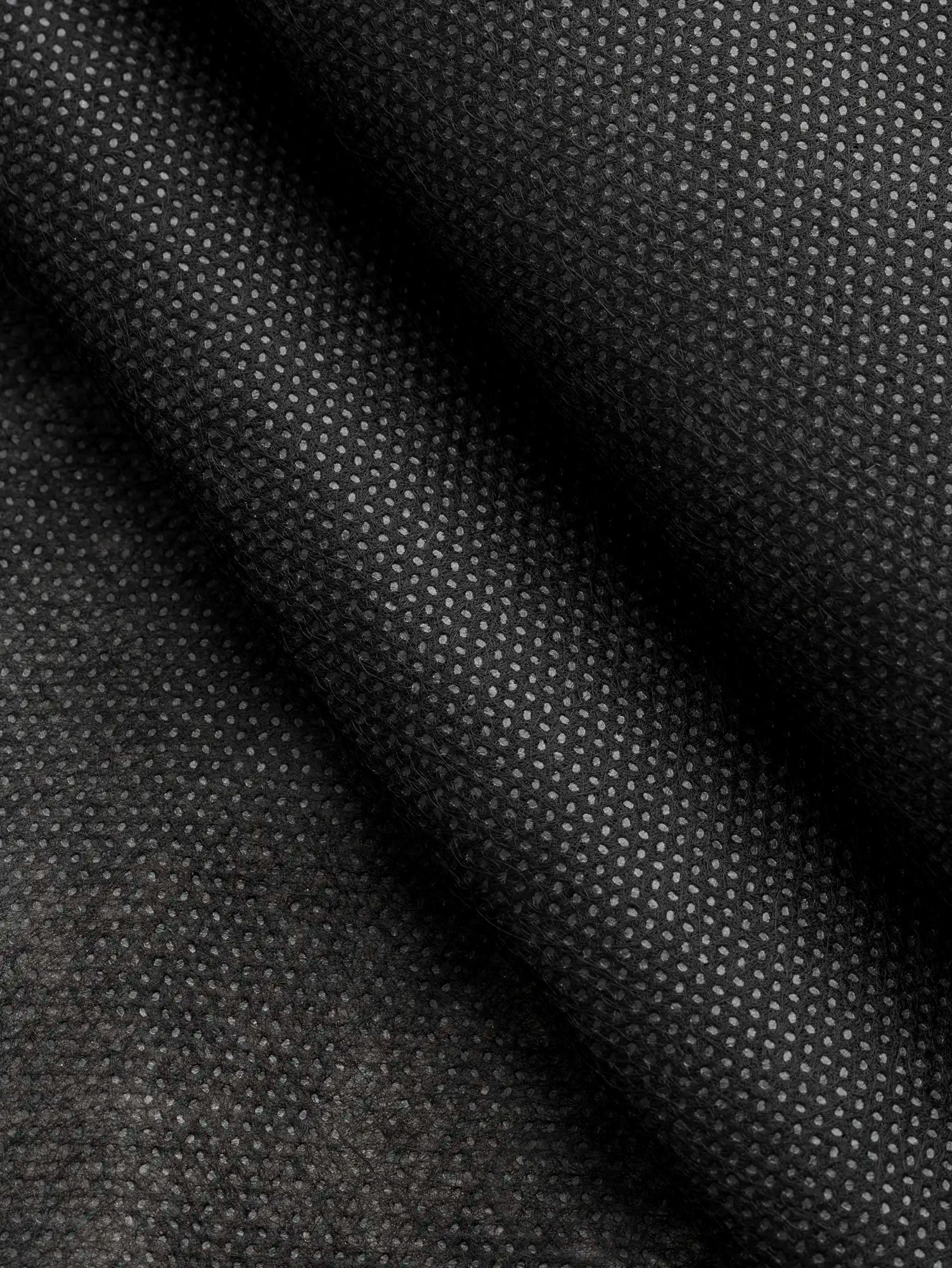 N-INT015-001-Ultra-Light-Non-Woven-Sew-On-Interfacing-Black-Core-Fabrics-fold.webp