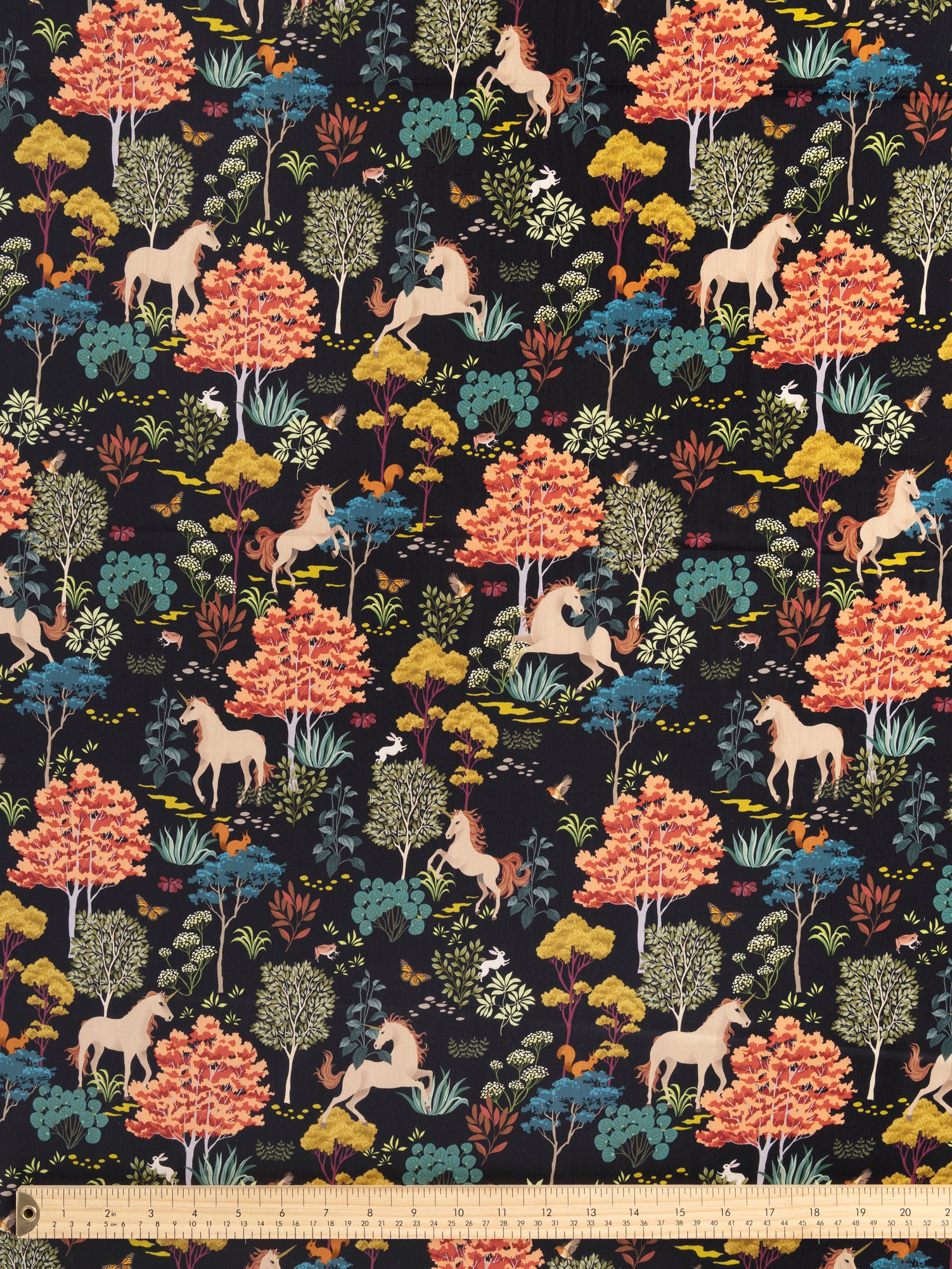 F-COT388-Unicorn-Print-Cotton-Lawn-Navy-Multicolour-Core-Fabrics-ruler.JPG
