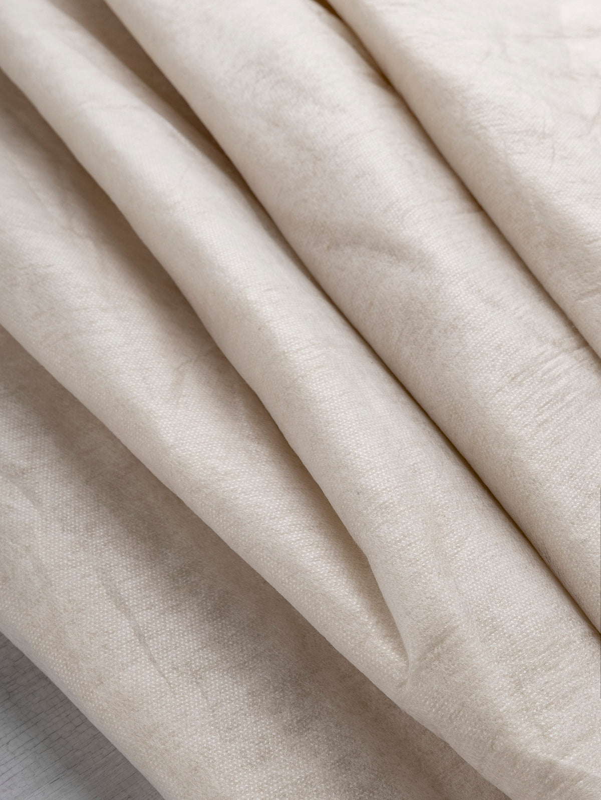 N-INT016-001-Vegeto-Insulating-Interlining-Core-Fabrics-scrunched.webp