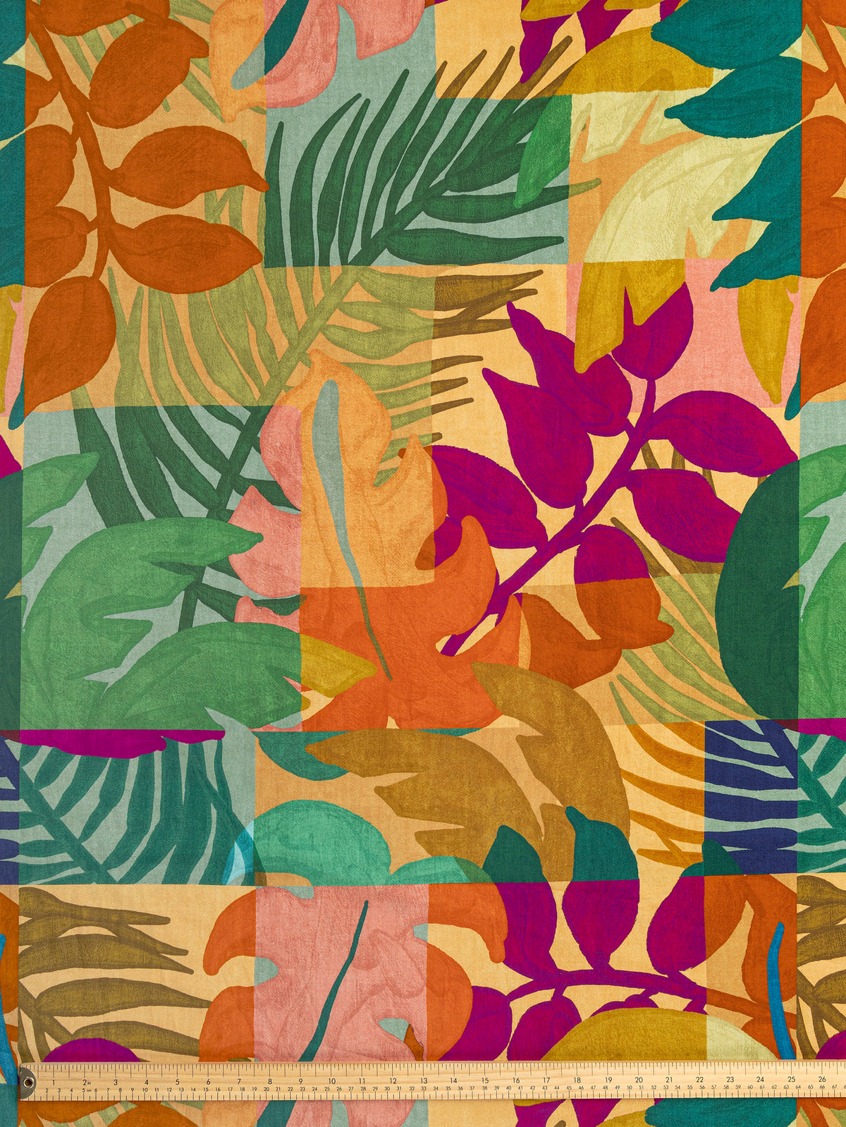 F-COT481-Vibrant-Leaf-Print-BCI-Cotton-Poplin-Magenta-Orange-and-Leaf-Core-Fabrics-ruler.webp