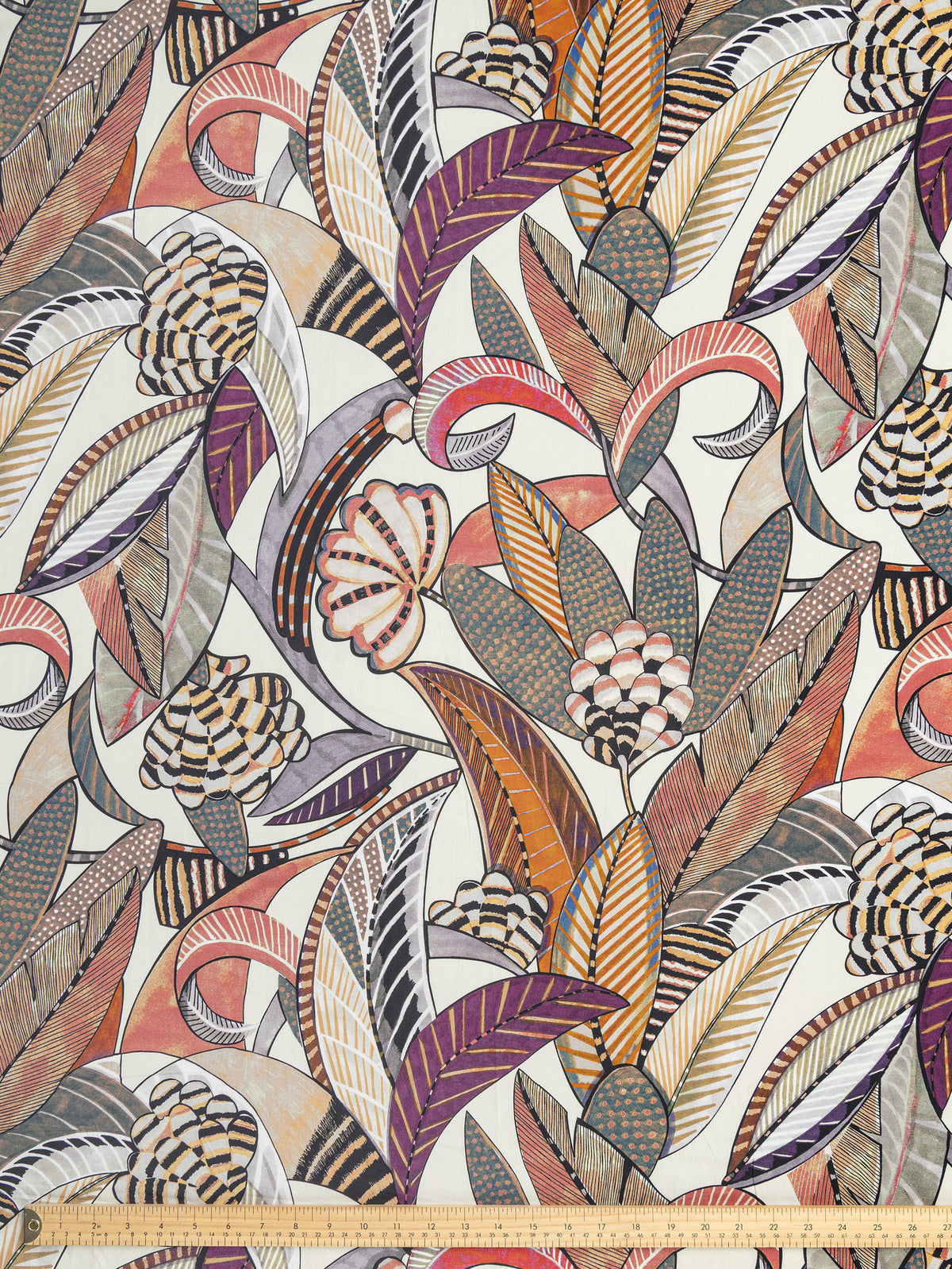 F-COT509-Vibrant-Leaf-Print-BCI-Cotton-Poplin-Pearl-Aubergine-and-Rust-Core-Fabrics-ruler.webp