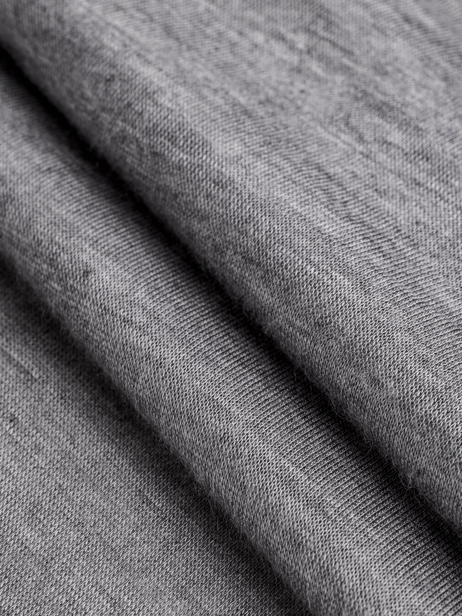 F-VIS284-Viscose-Silk-Jersey-Knit-Deadstock-Heather-Grey-Core-Fabrics-fold.JPG