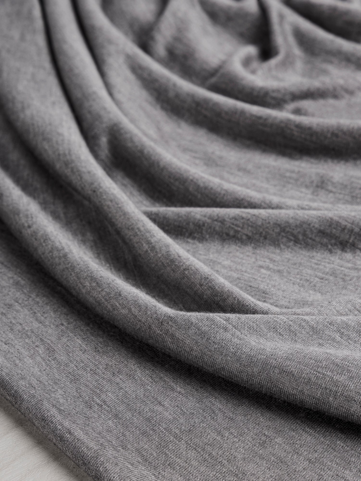 F-VIS284-Viscose-Silk-Jersey-Knit-Deadstock-Heather-Grey-Core-Fabrics-scrunched.JPG