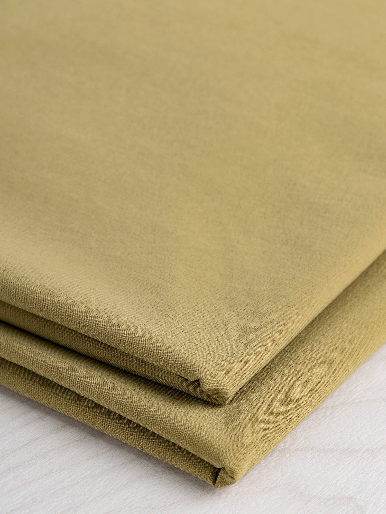 F-NYL018-001-Warp-Stretch-Wicking-Nylon-Deadstock-Driftwood-Core-Fabrics-Fold