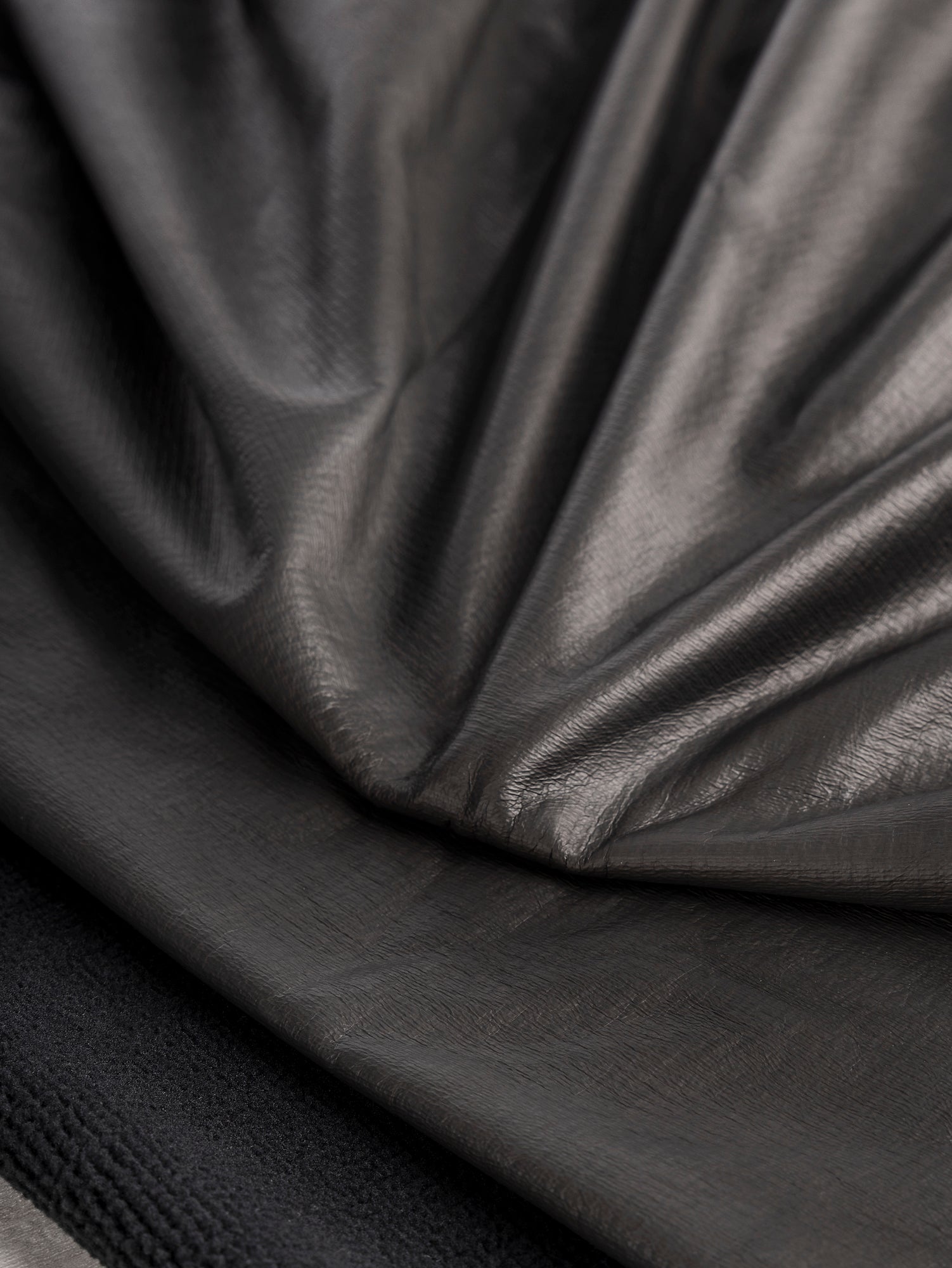 F-DEA083-Waterproof-Fleece-Back-Shell-Deadstock-Black-Core-Fabrics-scrunched.JPG