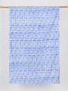 F-COT321-Wave-Artisanal-Cotton-Batik-Light-Blue-and-White-Core-Fabrics-draped