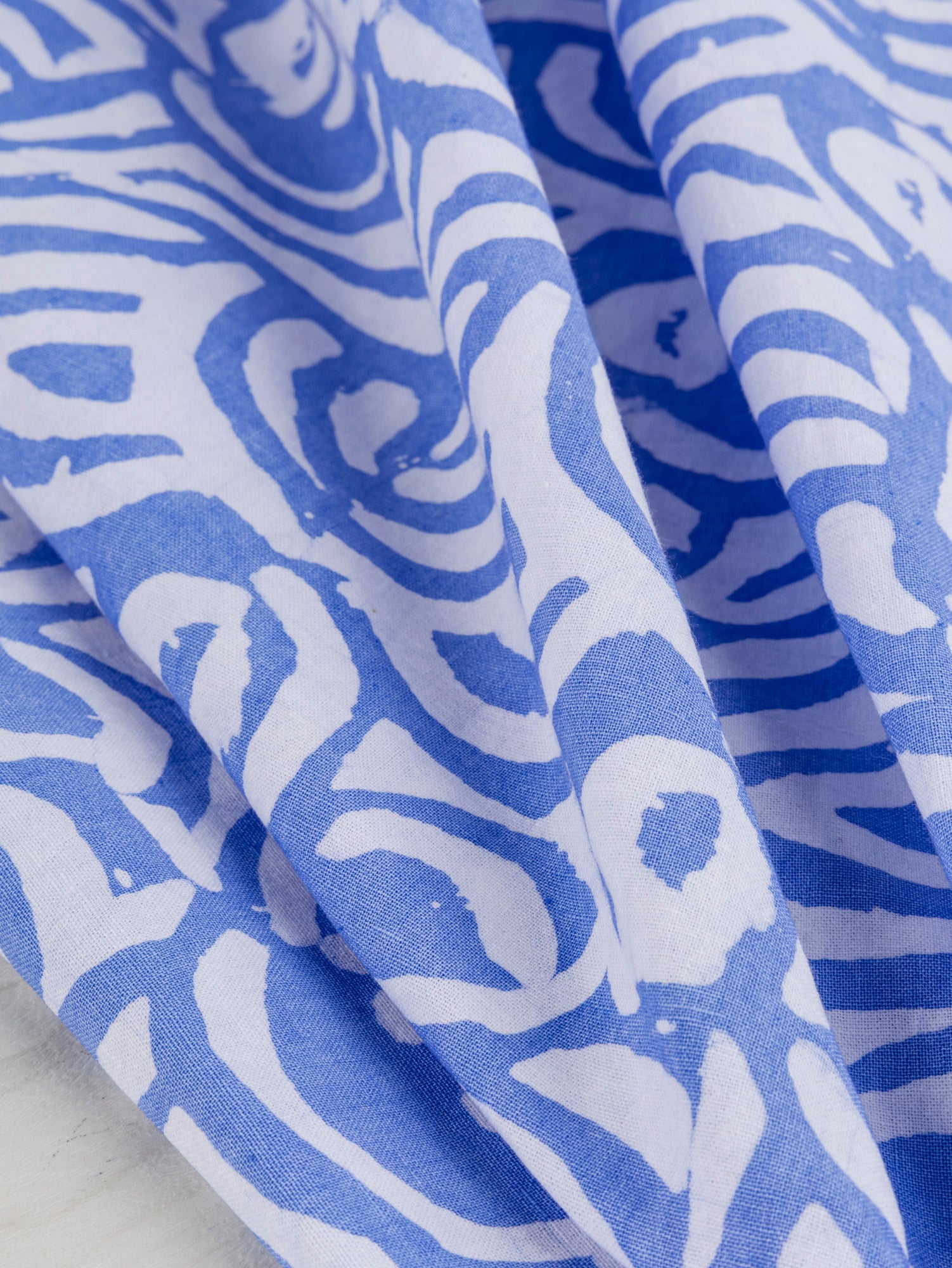 F-COT321-Wave-Artisanal-Cotton-Batik-Light-Blue-and-White-Core-Fabrics-scrunched