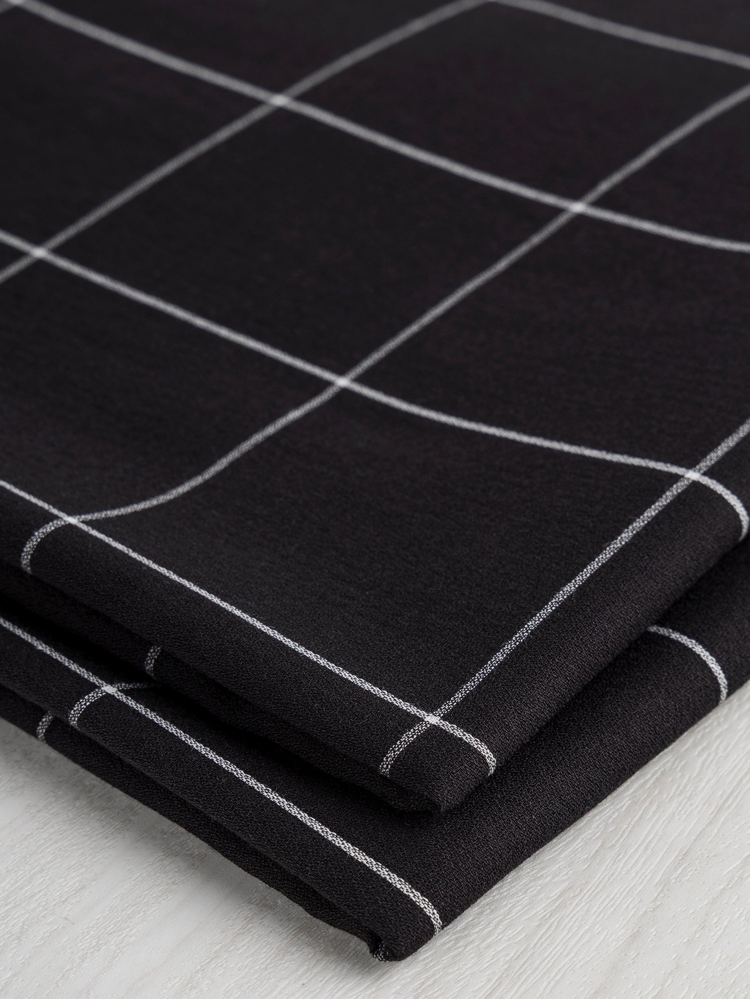F-COT367-Windowpane-Japanese-Organic-Cotton-Crepe-Black-and-White-Core-Fabrics-fold.JPG