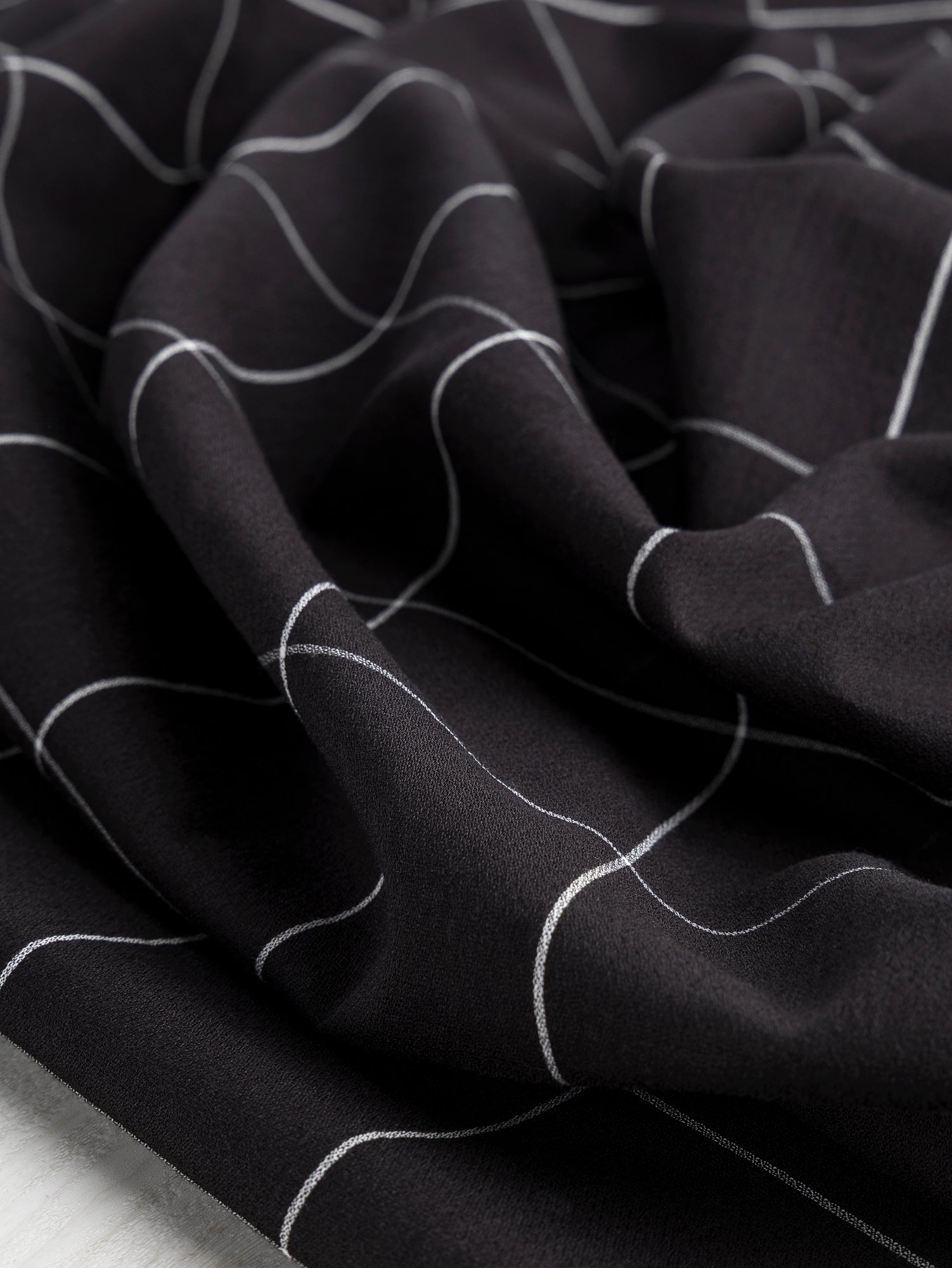 F-COT367-Windowpane-Japanese-Organic-Cotton-Crepe-Black-and-White-Core-Fabrics-scrunched.JPG