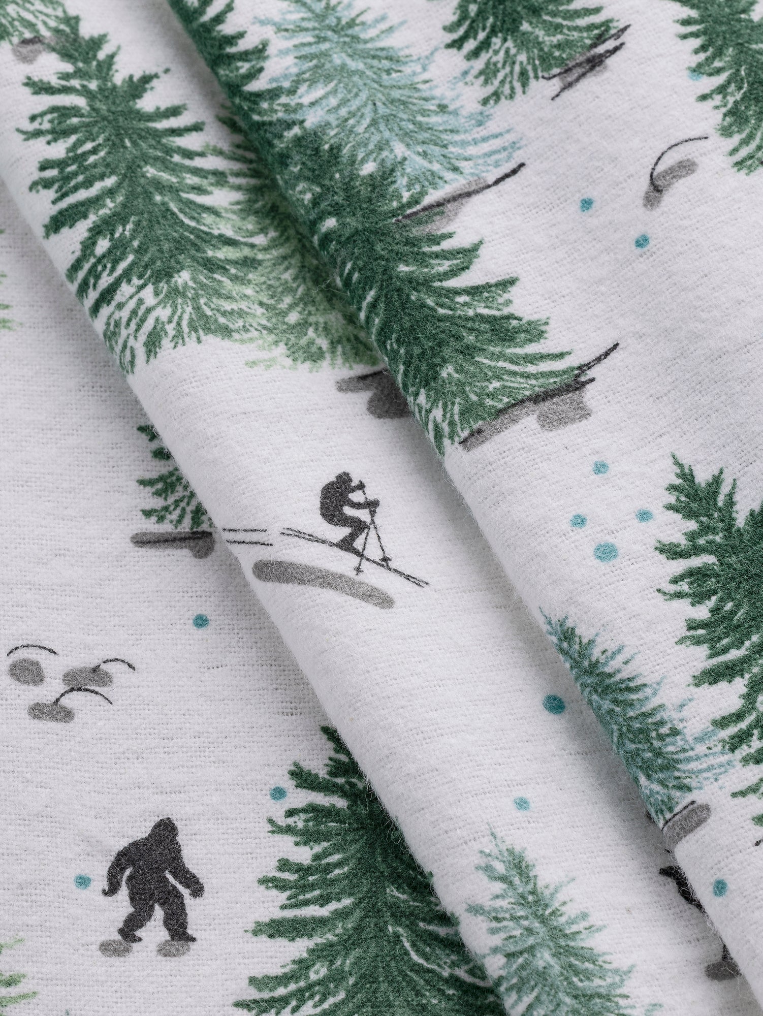 F-COT432-Winter-in-Canada-Print-Cotton-Flannel-Deadstock-White-Green-Blue-Black-Core-Fabrics-fold.JPG