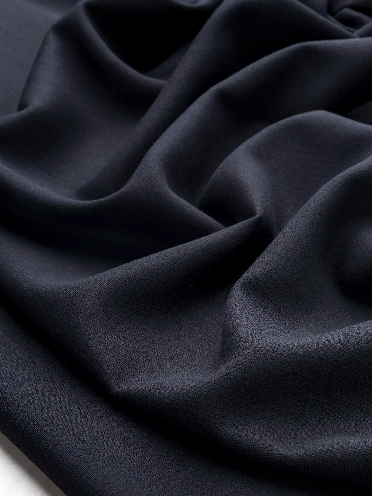F-WOL153-Wool-Italian-Suiting-Deadstock-Navy-Core-Fabrics-scrunched.webp