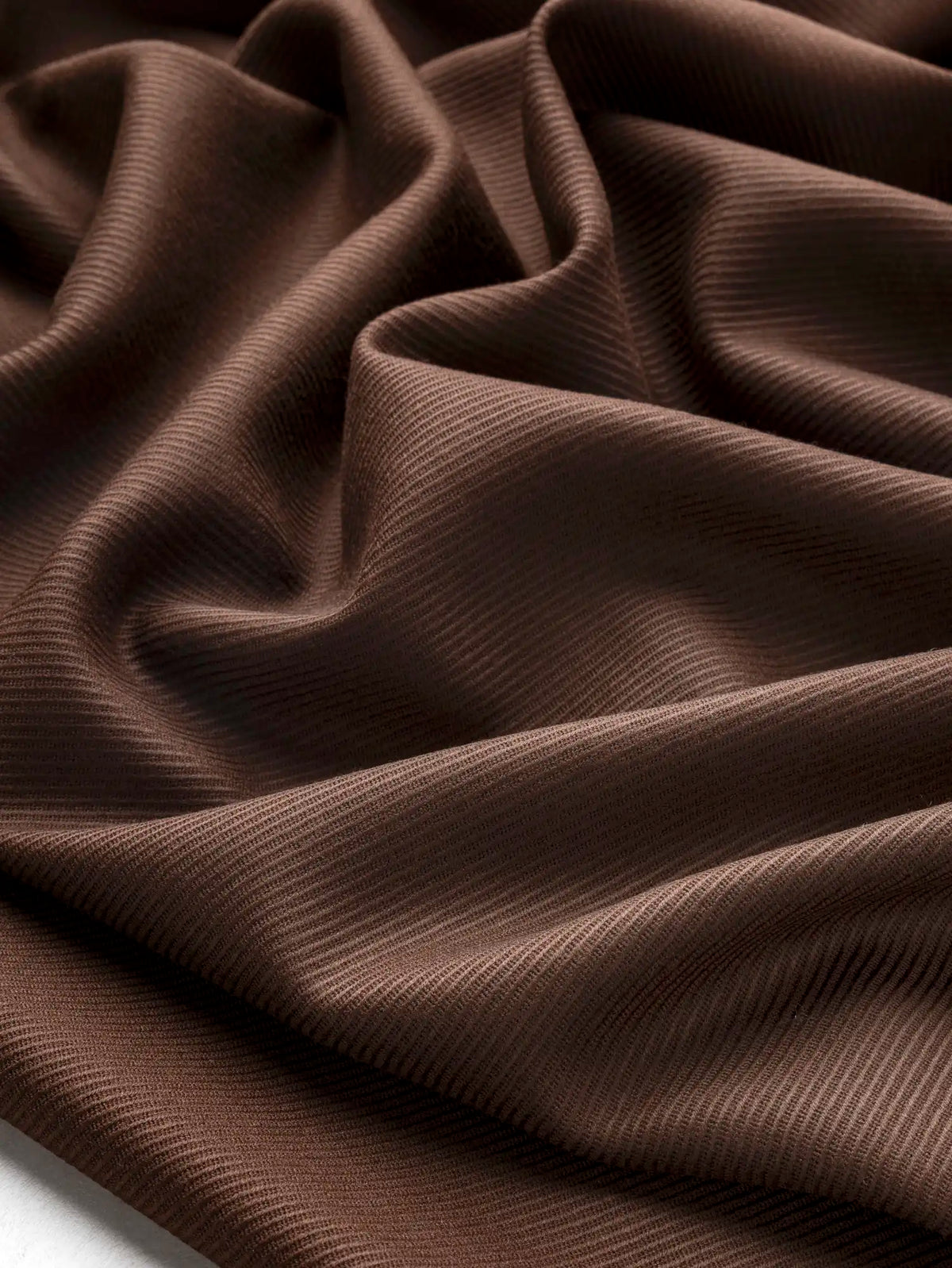 F-WOL157-001-Wool-Twill-Italian-Suiting-Deadstock-Toffee-Core-Fabrics-scrunched.webp