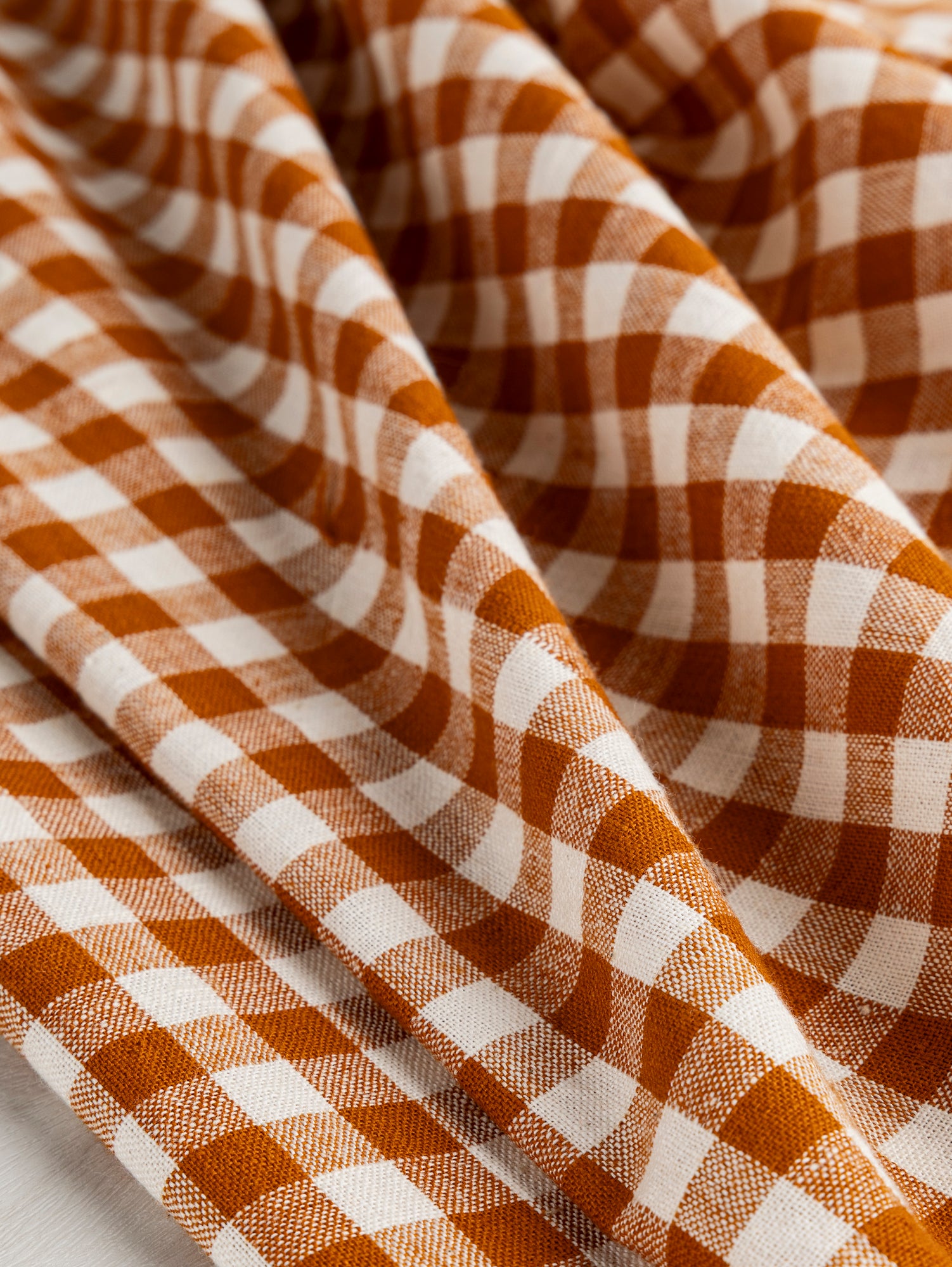 F-COT352-002-Yarn-Dyed-Handwoven-Gingham-Cotton-Rust+Cream-Core-Fabrics-scrunched.JPG