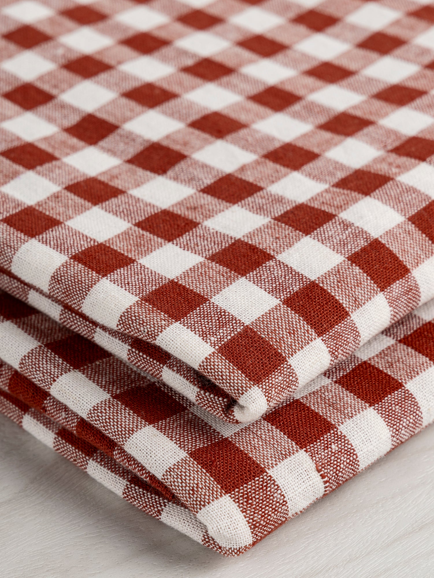 F-COT352-003-Yarn-Dyed-Handwoven-Gingham-Cotton-Sienna+Cream-Core-Fabrics-fold.JPG