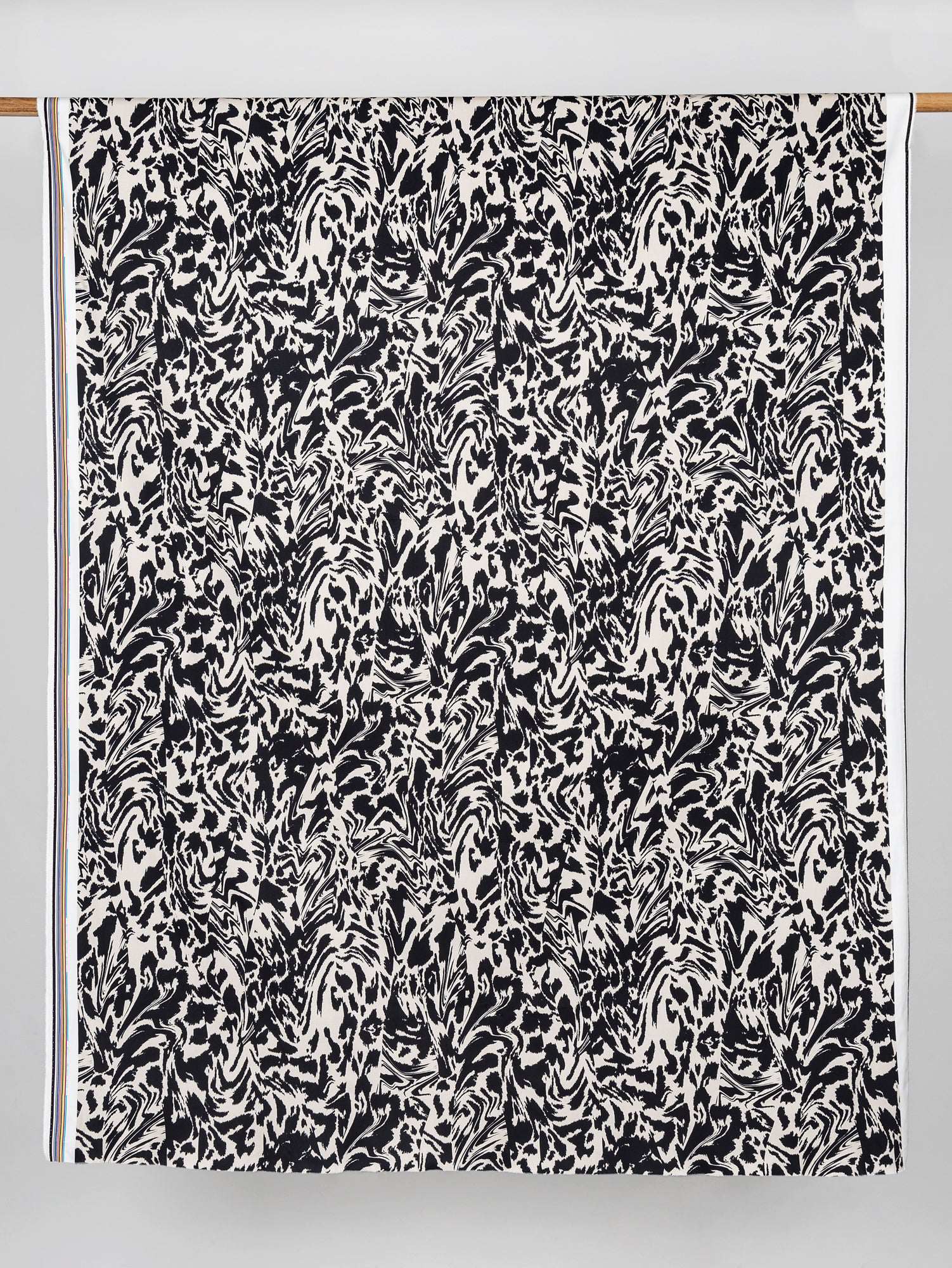 F-COT325-Zebra-Print-Stretch-Cotton-Bottomweight-Black-Cream-Core-Fabrics-draped