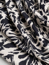 F-COT325-Zebra-Print-Stretch-Cotton-Bottomweight-Black-Cream-Core-Fabrics-scrunched