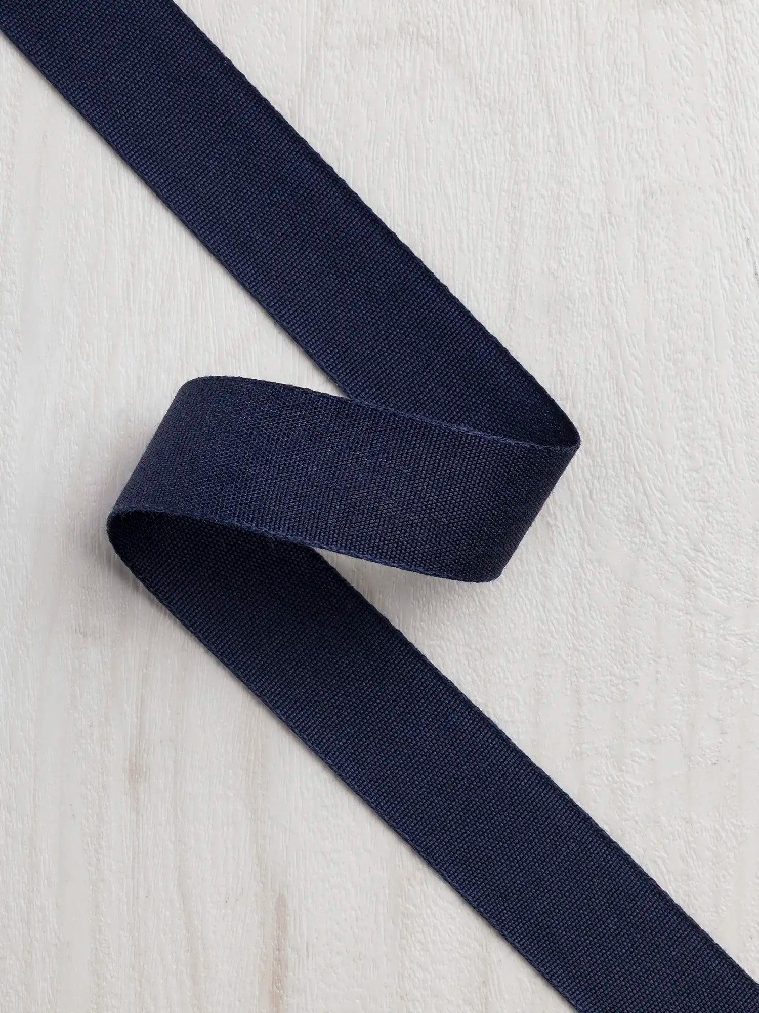 N-TAP025-003-Tencel-Lyocell-Grosgrain-Ribbon-25mm-Navy-Core-Fabrics.webp