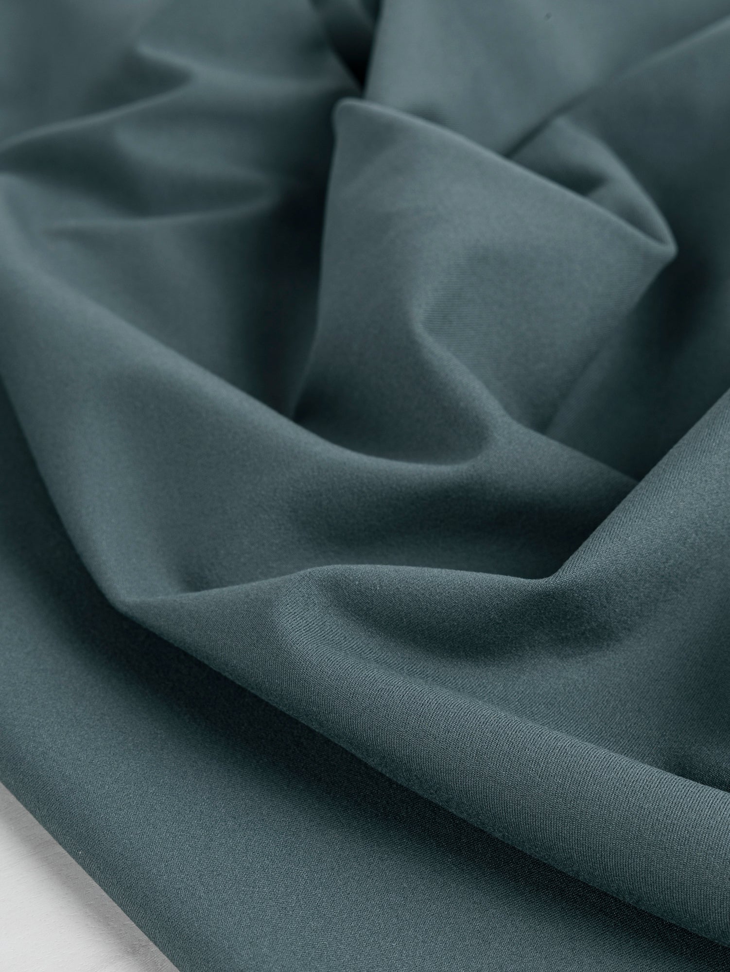 F-PES031-002-rPET-Wicking-Interlock-Deadstock-Green-Core-Fabrics-Scrunched