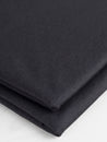 F-PES033-002-rPet-Poly-Performance-Stretch-Knit-Deadstock-Heather-Black-Core-Fabrics-fold.JPG