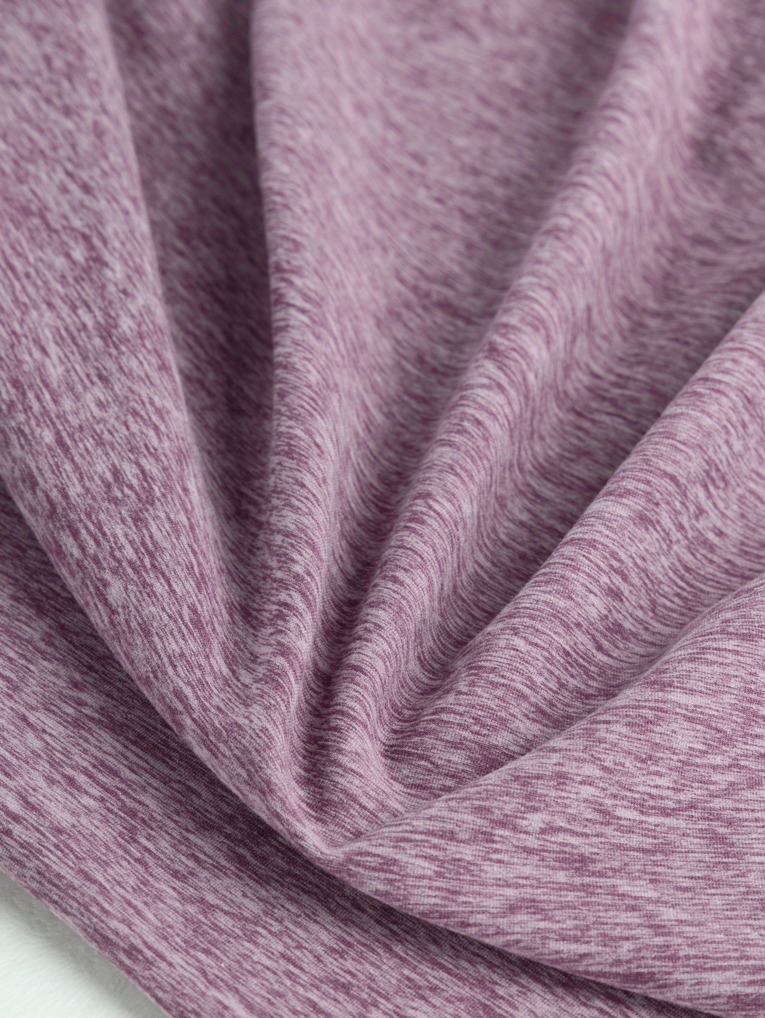F-PES033-003-rPet-Poly-Performance-Stretch-Knit-Deadstock-Heather-Mauve-Core-Fabrics-scrunched.JPG