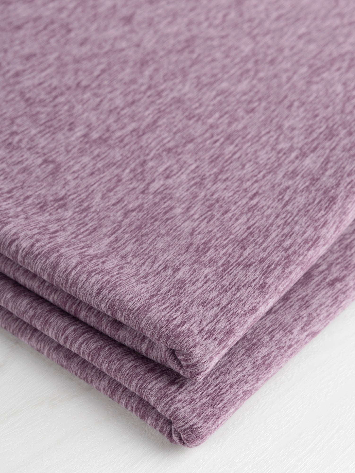 F-PES033-003-rPet-Poly-Performance-Stretch-Knit-Deadstock-Heather-Mauve-Core-Fabrics-fold.JPG