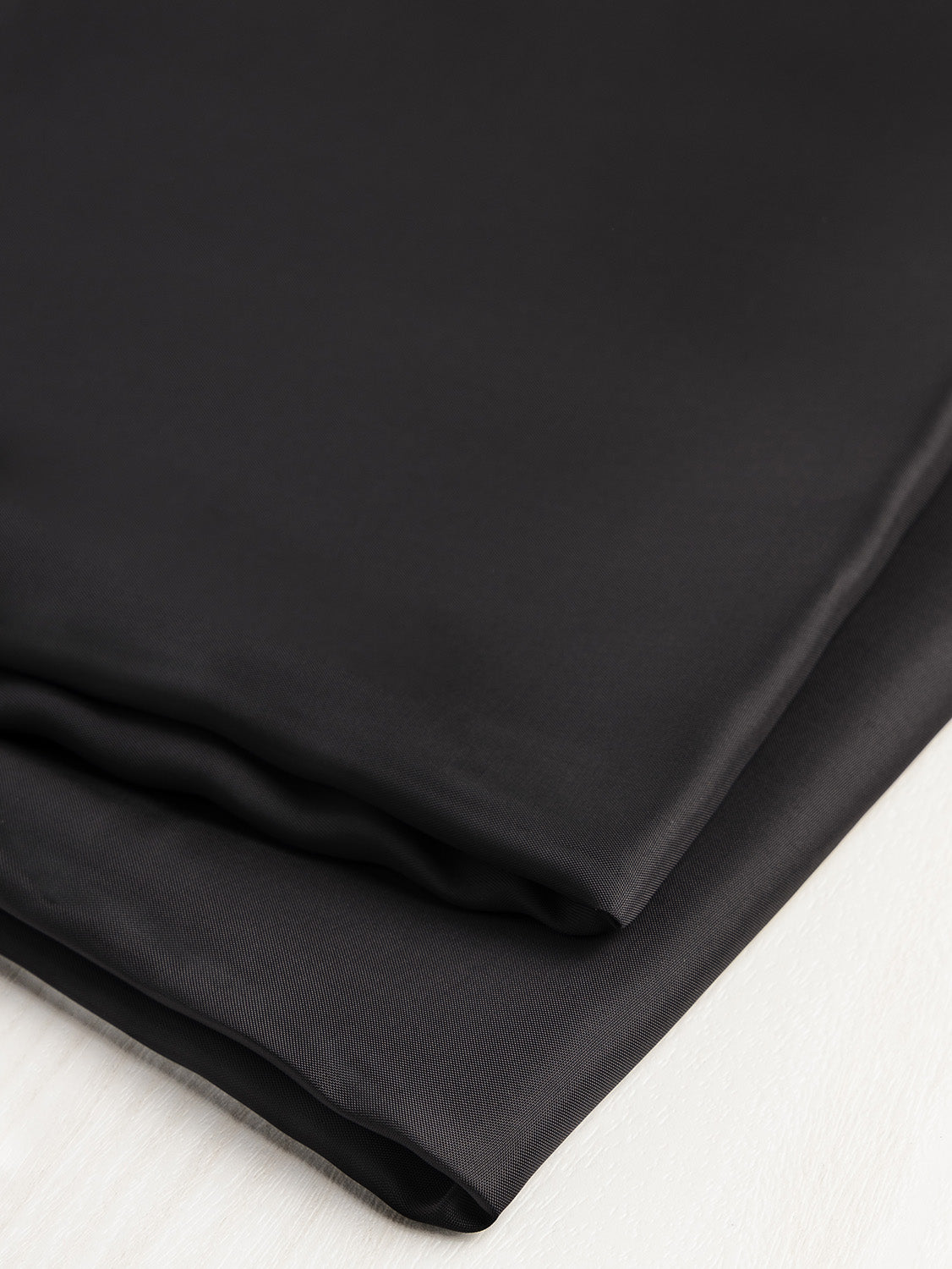 F-BEM001-000-Bemberg Cupro Lining Black-Core Fabrics - Folded