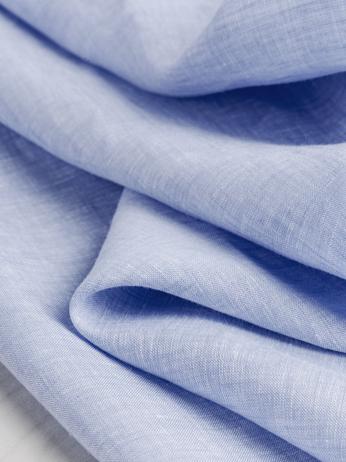 F-LIN025-003-Yarn-Dyed-Chambray-Linen-Powder-Blue-Core-Fabrics-scrunched.jpg