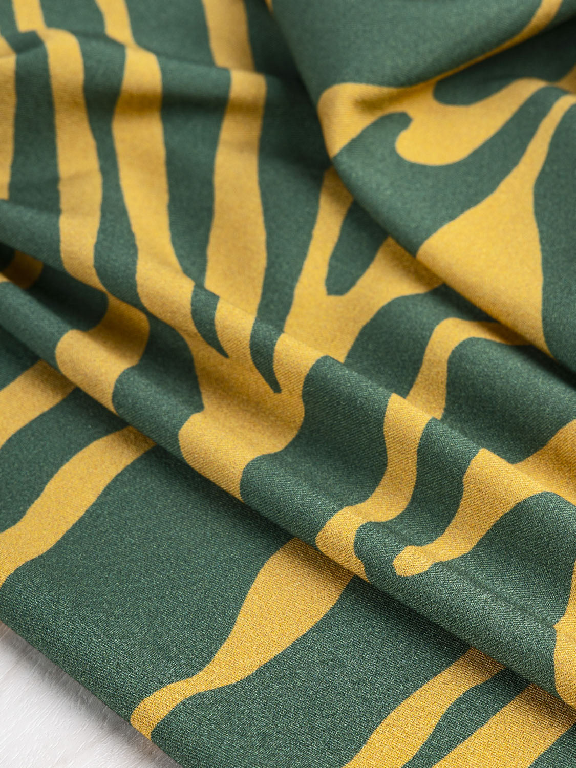 Graphic Zebra Border Print Stretch Viscose - Emerald + Topaz | Core Fabrics